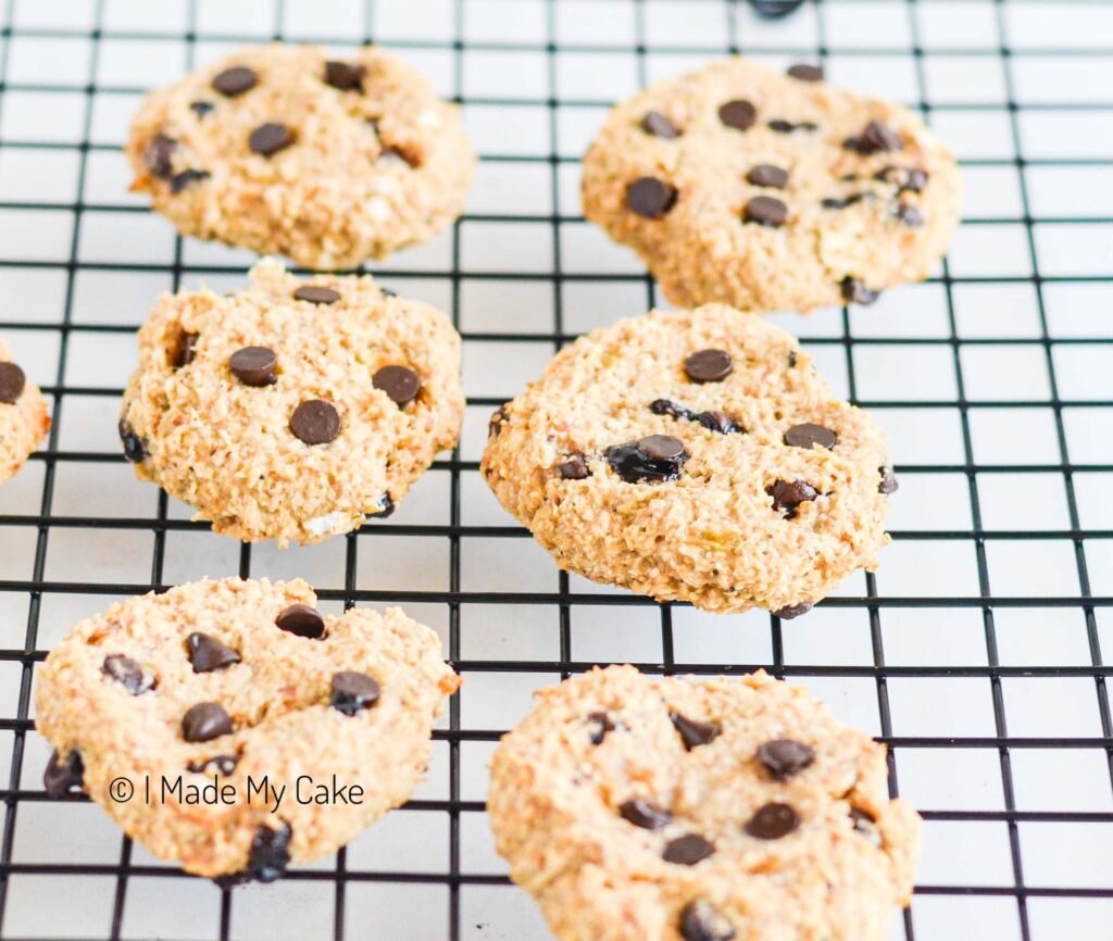 banana oatmeal cookies on a black cooling tray