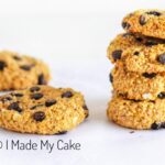 closeup of Stacked Banana Oatmeal Cookies on a white parchment paper