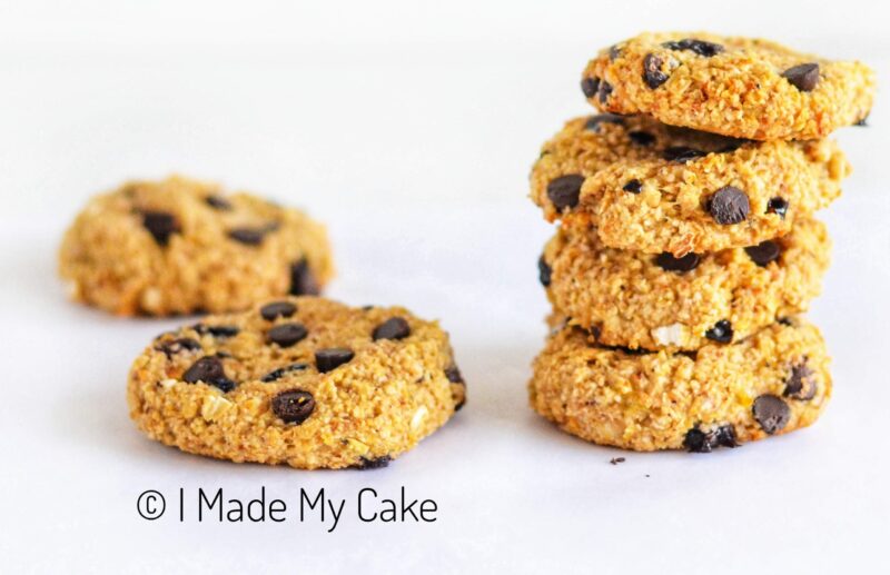 closeup of Stacked Banana Oatmeal Cookies on a white parchment paper