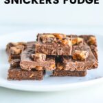 snicker fudge slices on a white plate