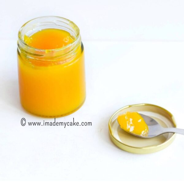 a spoon of mango jam from the jar