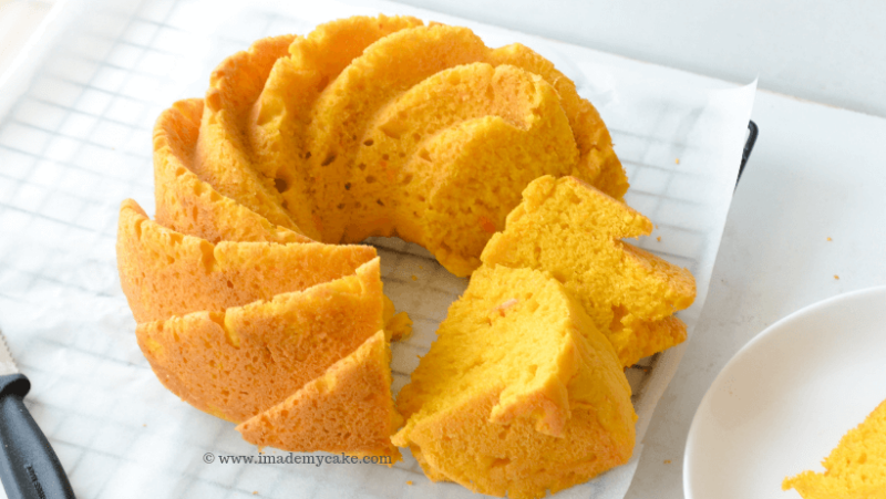 eggless mango bundt cake on a parchment paper