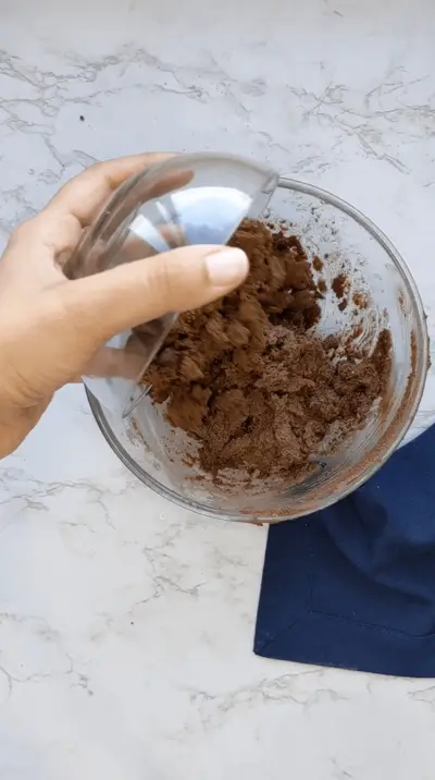 add the jaggery powder for making ragi cookies